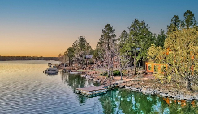 Luxury Waterfront Cabin at Rainbow Lake w/AC, Hot Tub, Game Room, Dock & Kayaks