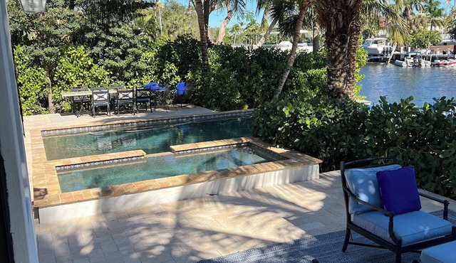 Luxury Waterfront 3 bed home with dock, walking from beach and restaurants.