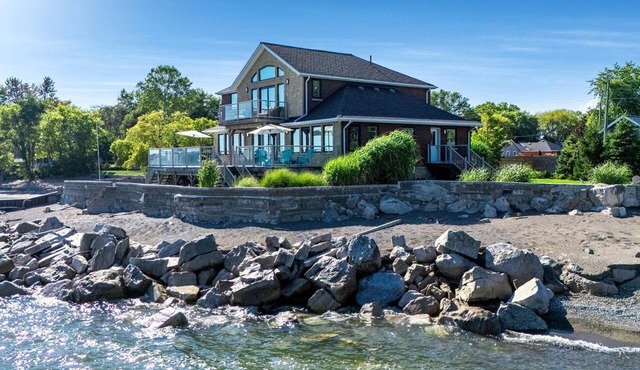 Luxury Waterfront Estate with Beach Access and Expansive Grounds in Ontario, Canada