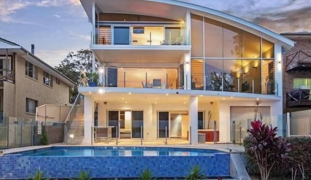 Luxury Waterfront Home with pool and spa family and pet friendly.