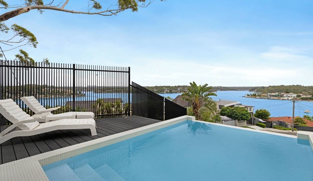 Luxury Waterside Sanctuary with pool, sensational views, 2 decks & lift!