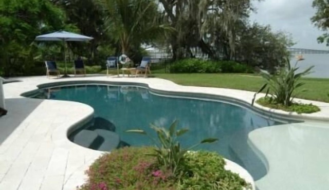 Magical Waterfront Home,Sunsets, Guest House, Beach, Dock, game room, Playground