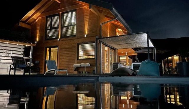 Magnificent chalet in the Alps near the ski resorts in a green setting