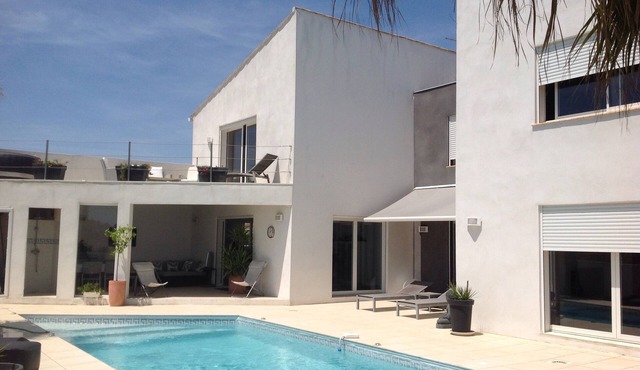 Magnificent architect designed villa for a quiet holiday near the sea .