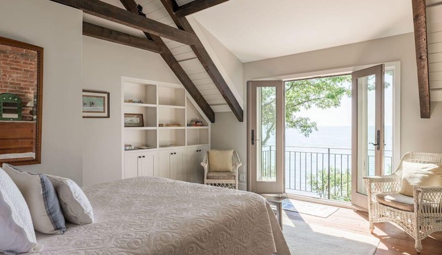 Magnificent lakefront home with private sand beach