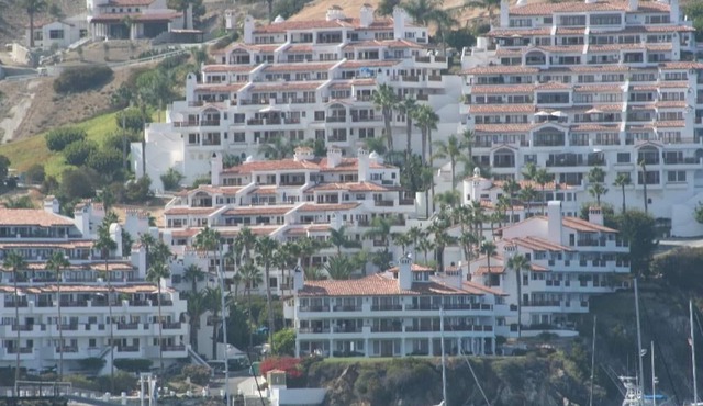 MAGNIFICENT OCEAN VIEW Hamilton Cove Condo With Golf Cart Included.