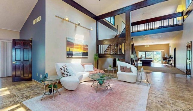 Magnificent waterfront paradise w/private dock & access to community pool