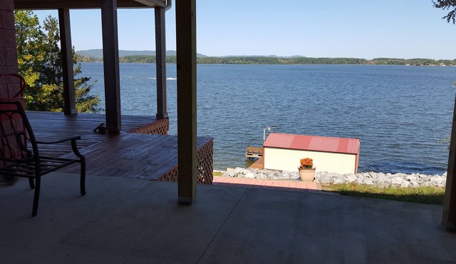 Main Channel Lake Guntersville waterfront home with beautiful view & deep water.