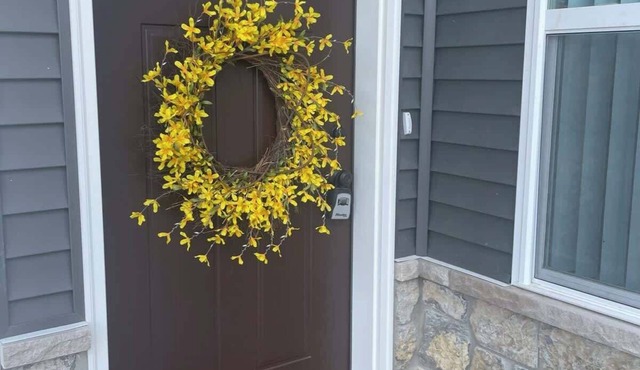 Main Floor 2 Bedroom Condo in Bettendorf featuring king bed in master