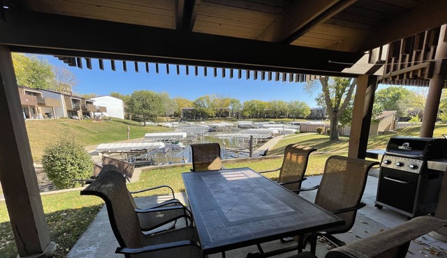 Main Floor Condo Fully Furnished with access to indoor pool/hot tub.