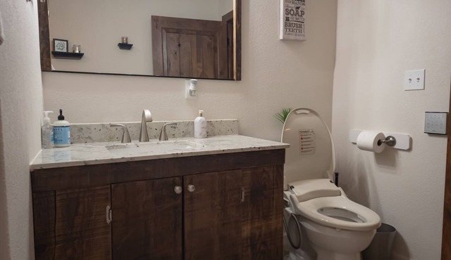 Main floor studio well-furnished room. Unit 2 with bath/shower bidet toilet