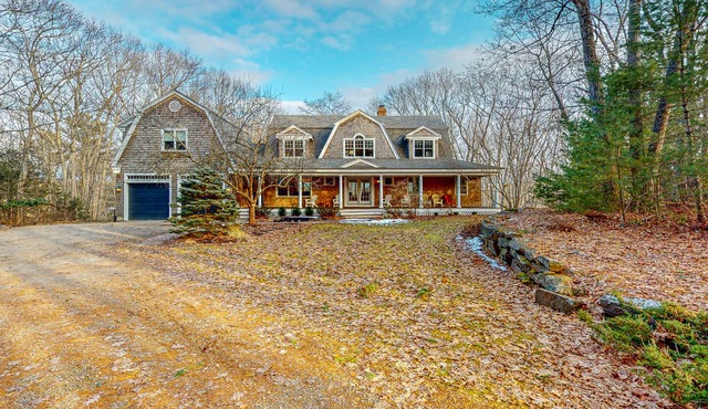 Maine-by-the-Sea home on five acres with a guest suite, water views, & grill