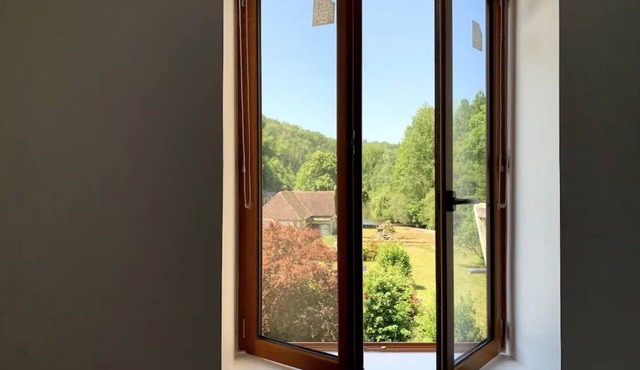 Maison au Bord de la Rivière