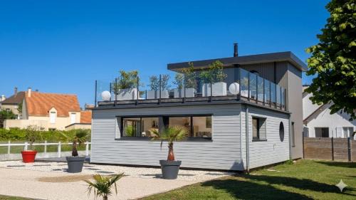 Maison avec toit terrasse