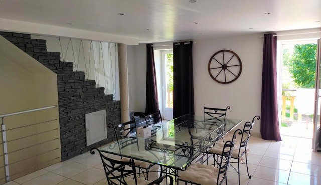 Maison chaleureuse et atypique