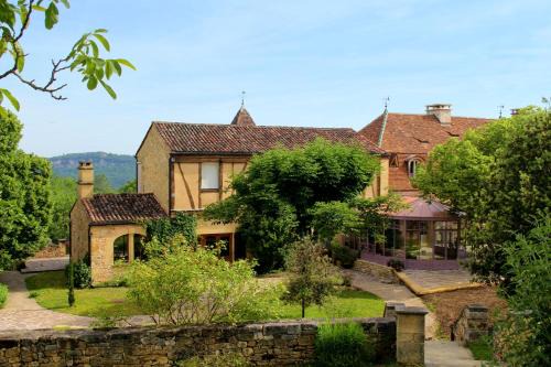 Maison charmante à Saint-Cybranet avec grand jardin, piscine