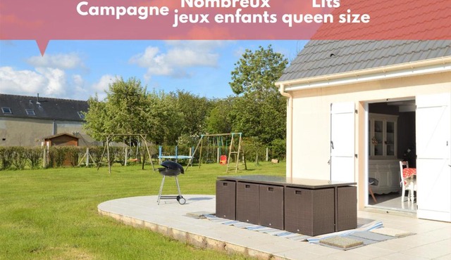 Maison confortable séjour spacieux, belle terrasse avec grand jardin avec jeux extérieurs près Bayeux et Omaha Beach