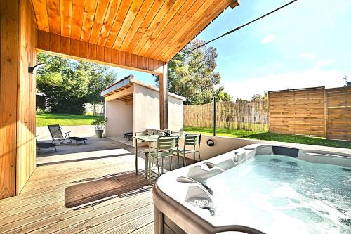 Maison cosy avec spa extérieur et vélos électriques