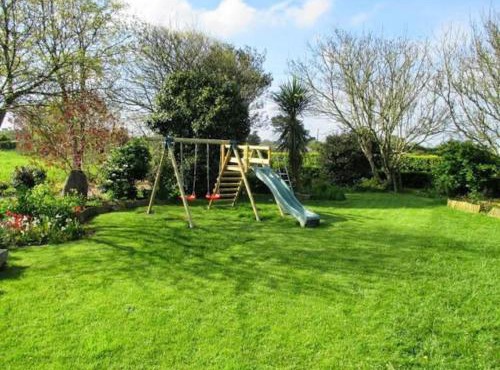Maison dans son écrin de verdure
