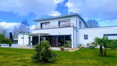 Maison Mélusine ossature bois forêt de Brocéliande