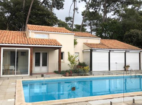 Maison piscine partagé vers ocean