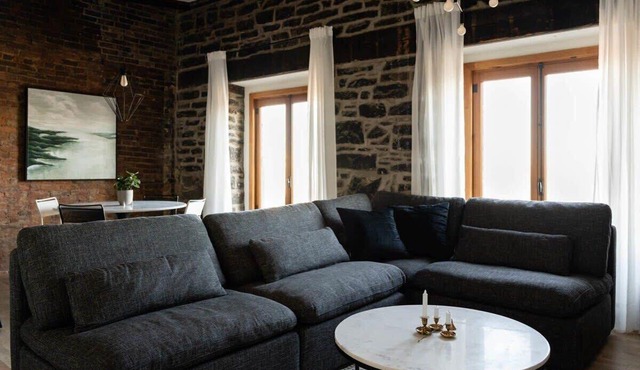Maison Place Royale Luxury Waterfront One-Bedroom Apartment Old Montreal Water View St. Lawrence River Full Kitchen Stone Walls Wi-Fi AC