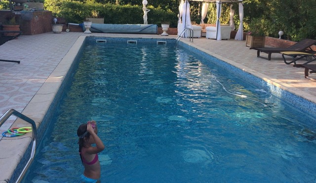 Maisonette with small garden on large property