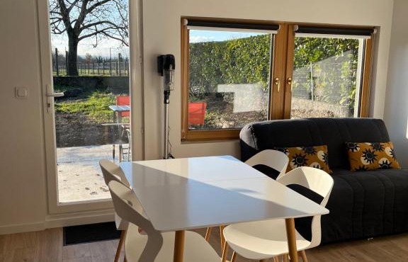 Maisonnette avec parking privé et local à velos