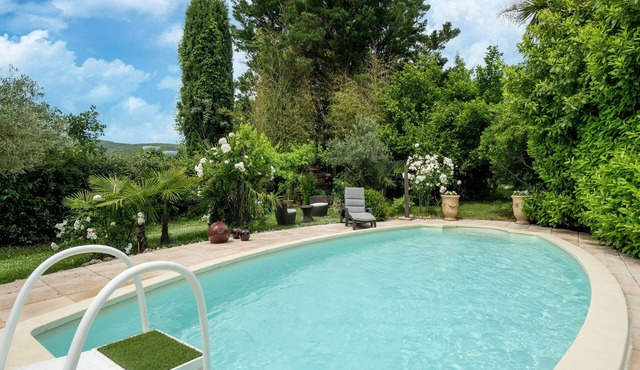 Majestic holiday home in Laroque with hot tub