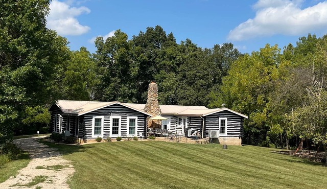 Make a SPLASH at Patten's Landing, an 84-year old log cabin!