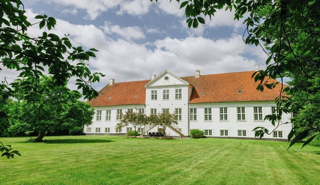 Manor with soul between forest and lake on Funen