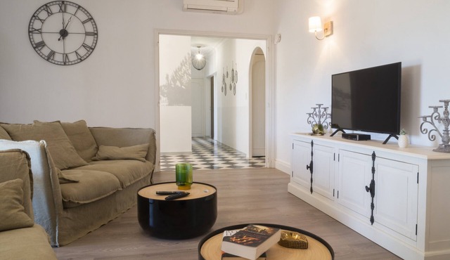 Mas Provençal first floor living room with fireplace and veranda overlooking Alpilles- Vallée des Baux