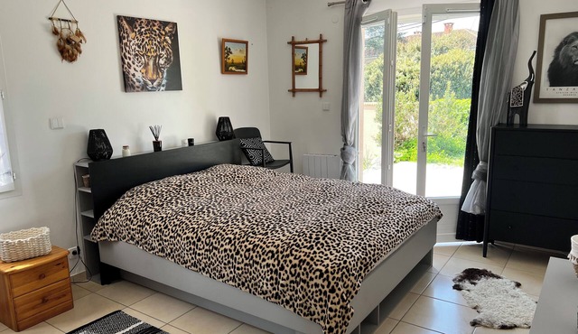 Master suite in single-storey house with terrace