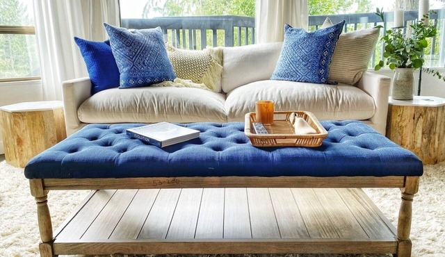 mbrace nature in this bright home that has gorgeous views to the lake and forest