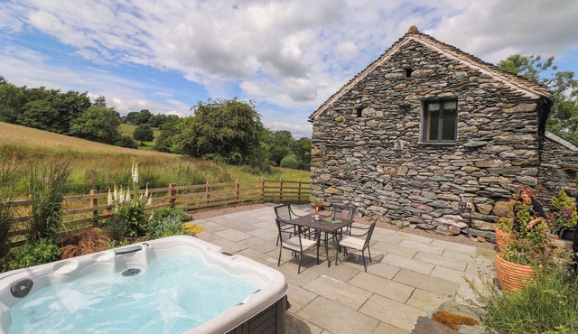MEADOW SYKE BARN, pet friendly, with hot tub in Bampton, Cumbria