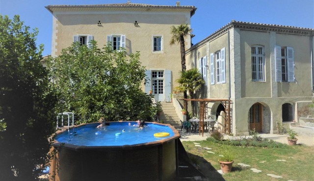 Medieval house, terrace in the sun, shady enclosed garden, swimming pool