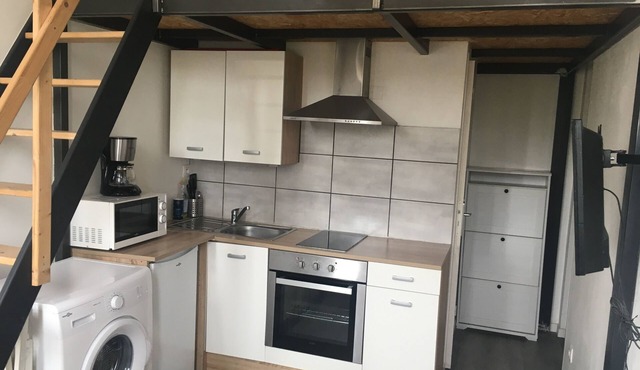 Mezzanine studio in listed residence