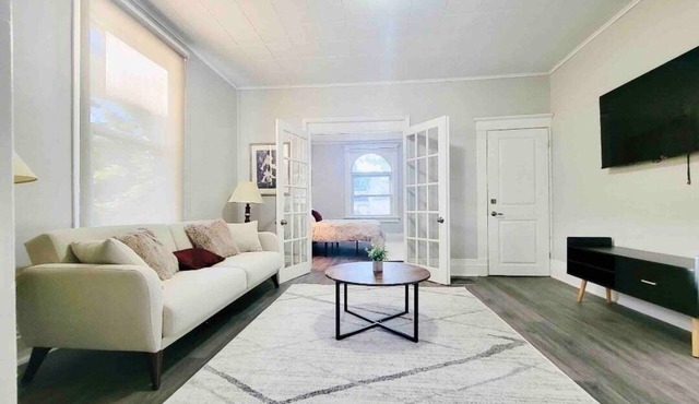 Mid century apartment with private backyard and deck