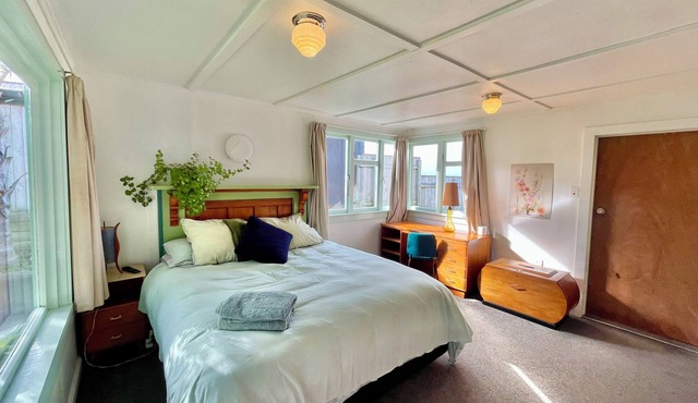 Mid-Century Beach Front Bach with beach access 2 doors down and superb views