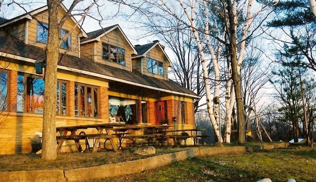Mid-century family retreat with a breathtaking view and a private beach!