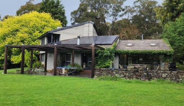 Mid century farmhouse located in the heart of Exeter Village.