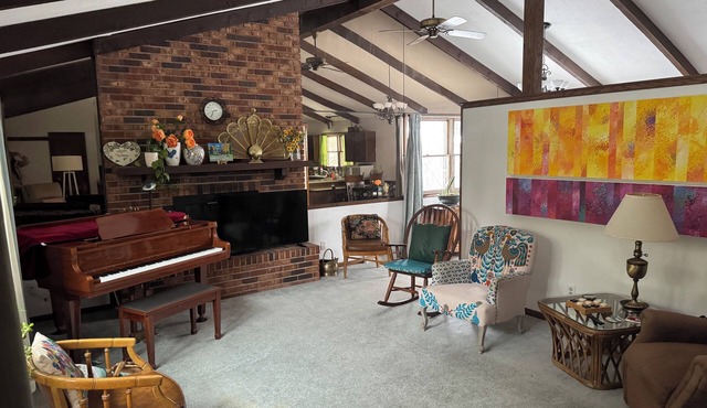 Mid-century Modern Home with Large Deck and Cozy Living Area