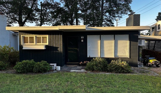 Mid-Century Rivah Retreat with Dock, Fire Pit & Cozy Fireplace