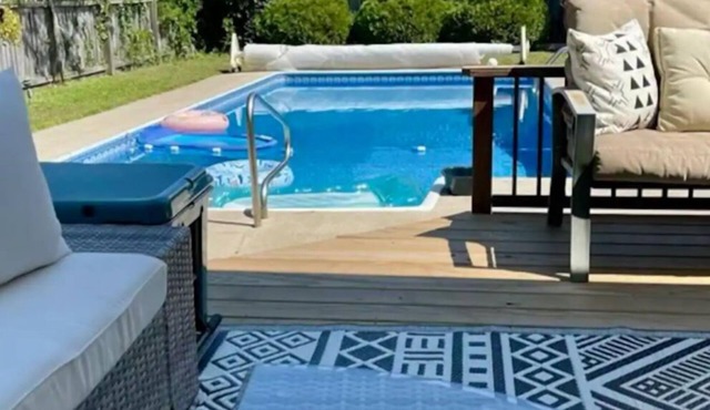 Mid island oasis with large pool and outdoor entertainment area. Pet friendly!