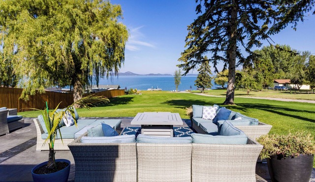 Midcentury Modern Lake Home with Stunning Views, Beach, Game Room & Hot tub.
