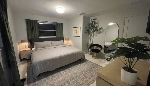 Midcentury Rambler with large backyard and open patio.