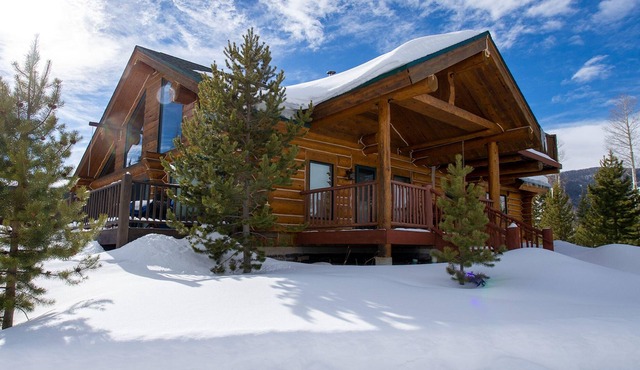 Miles Behind Log Cabin by Stay Winter Park