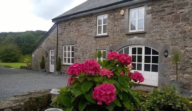 MILL COTTAGE - a cosy rural cottage with private fishing lake