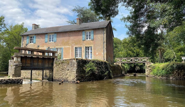 Mill on the banks of the Indre in Berry. A bucolic, historic site on an island