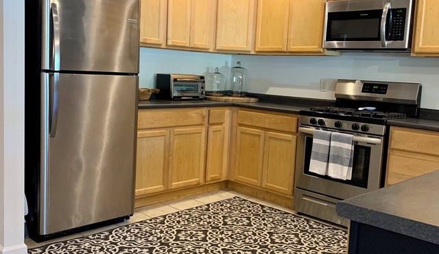 Millie’s apartment located at 4corners directly behindTom’s Doughnuts,Lake James